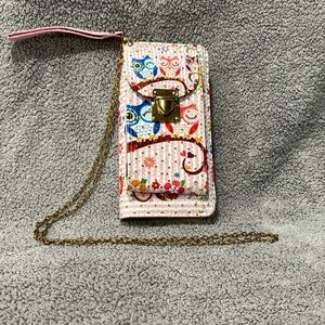 Pink and white stripe wristlet with owls on it
